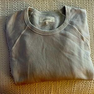 Distressed light blue sweatshirt